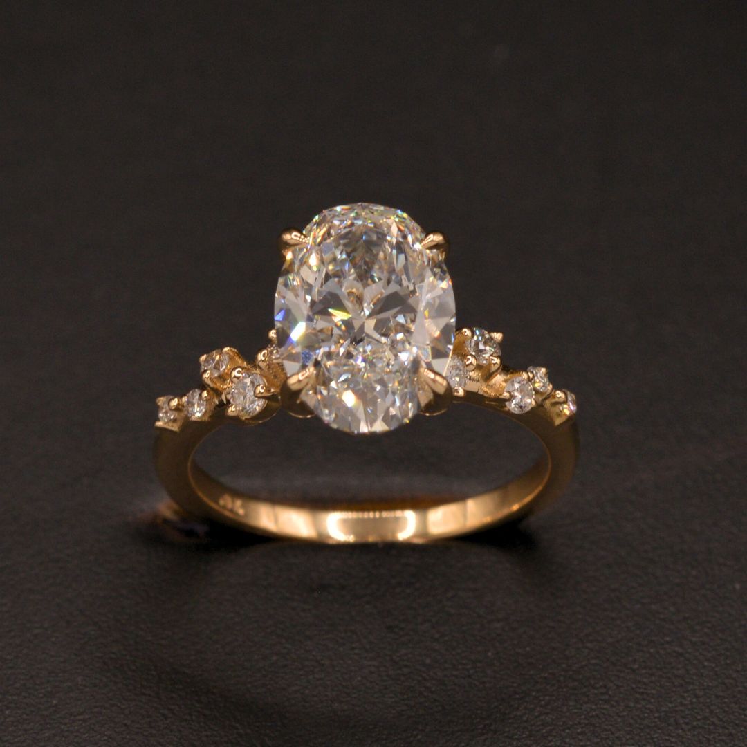 Oval Diamond Engagement ring with a vine shank