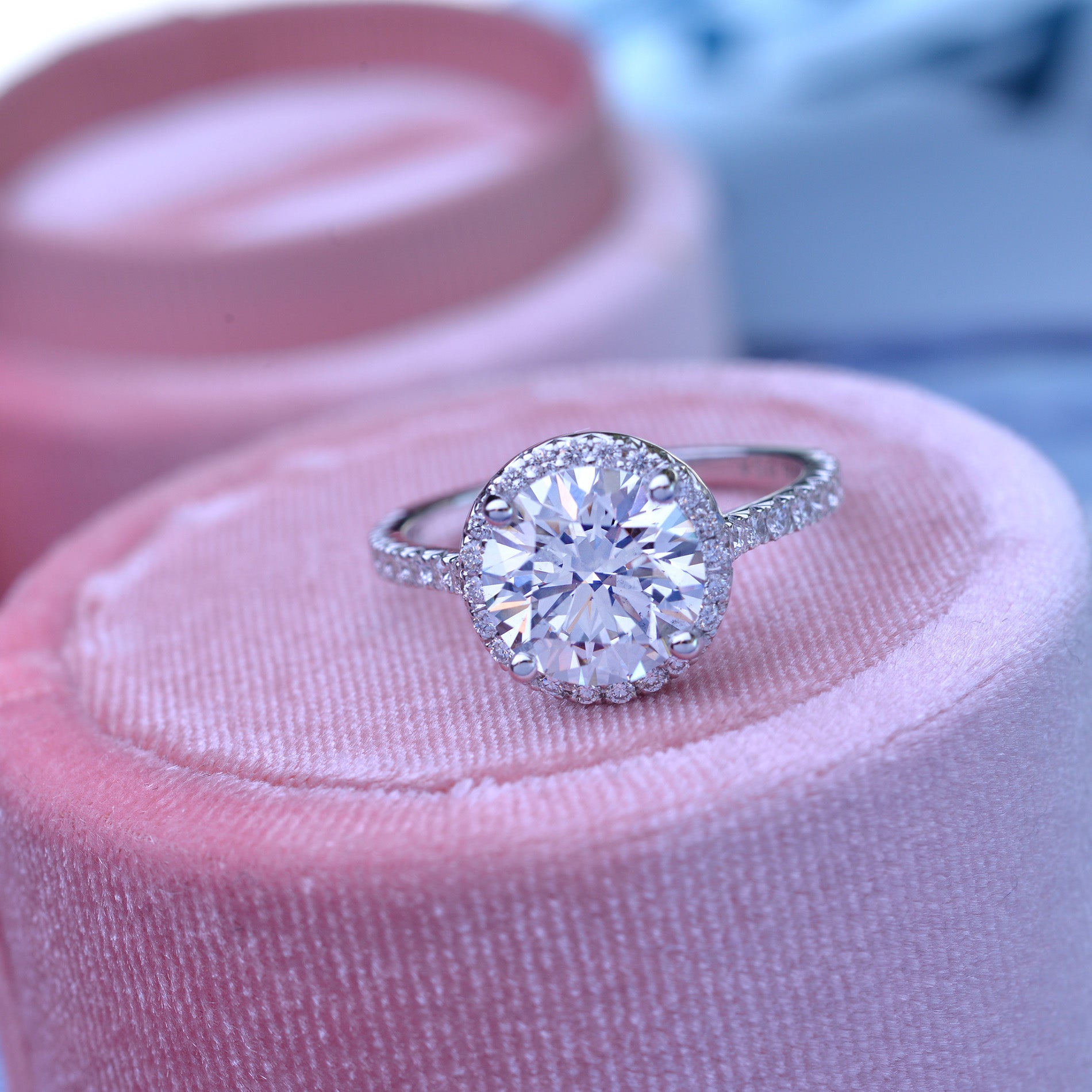 3 carat oval Halo engagement ring french cut pave in white gold with a lab grown diamond