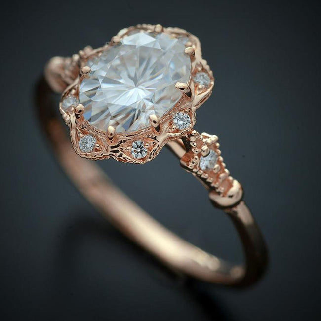 oval halo vintage inspired engagement ring in rose gold