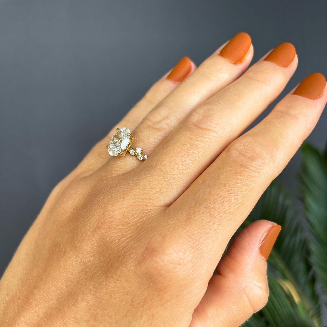 Oval Diamond Engagement ring with a vine shank