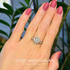 Three stone Oval Halo engagement ring classic style