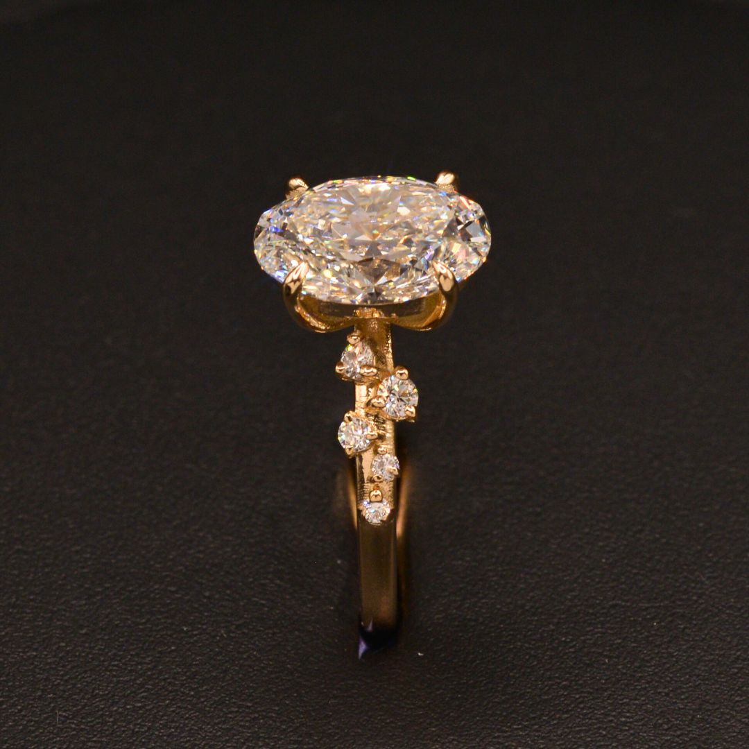 Oval Diamond Engagement ring with a vine shank