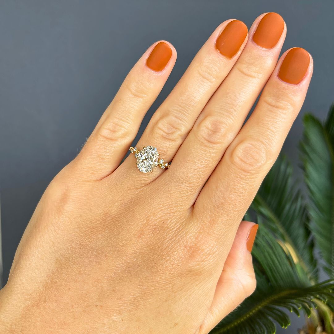 Oval Diamond Engagement ring with a vine shank