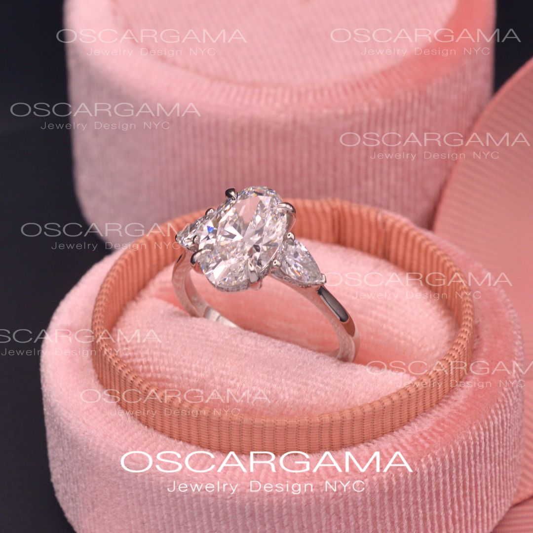 Classic 3 stone Oval with Pear Shape diamonds