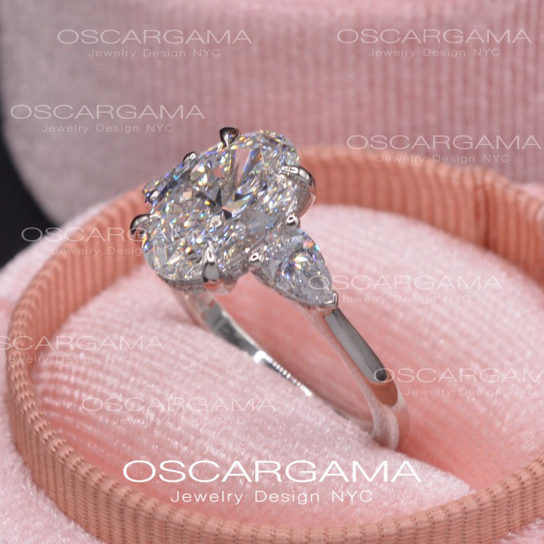 Classic 3 stone Oval with Pear Shape diamonds