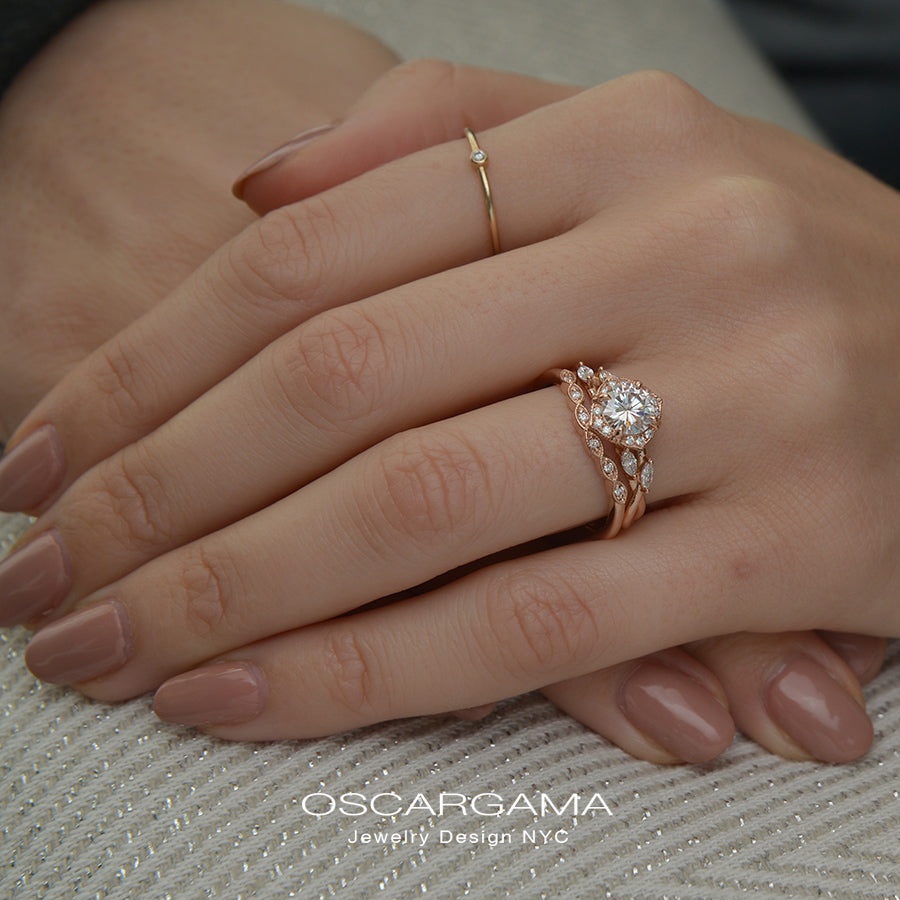 Rose gold engagement ring vintage inspired halo with a twist band  in a hand