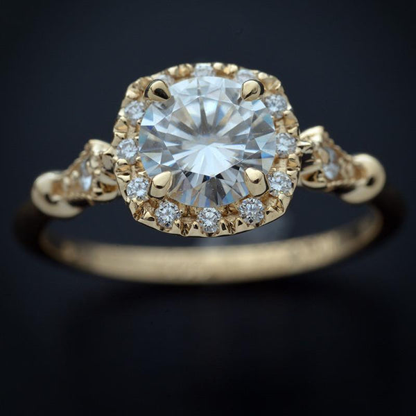 Yellow gold cushion halo engagement ring vintage style