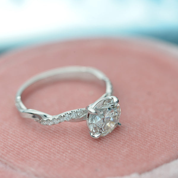 Classic Twist Solitaire diamond engagement ring with micro pave