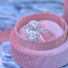 3 carat oval Halo engagement ring french cut pave in white gold with a lab grown diamond