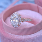 Oval halo 2.5 carat engagement ring with french cut pave in rose gold Vintage inspired