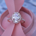 Oval halo 2.5 carat engagement ring with french cut pave in rose gold Vintage inspired