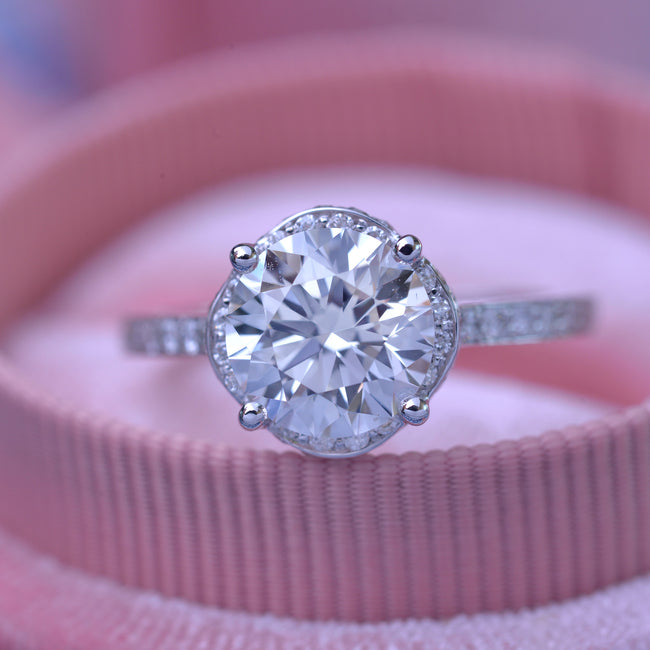 round solitaire engagement ring under halo in white gold with 2 carat lab grown diamond