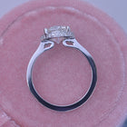 round solitaire engagement ring under halo in white gold with 2 carat lab grown diamond front view