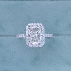 2.5 carat Emerald Halo engagement ring french cut pave in white gold lab grown diamond top view