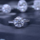 round solitaire engagement ring under halo in white gold with 2 carat lab grown diamond