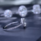 round solitaire engagement ring under halo in white gold with 2 carat lab grown diamond side view