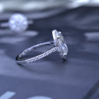 3 carat oval Halo engagement ring french cut pave in white gold with a lab grown diamond side view