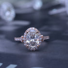 Oval halo 2.5 carat engagement ring with french cut pave in rose gold Vintage inspired front view