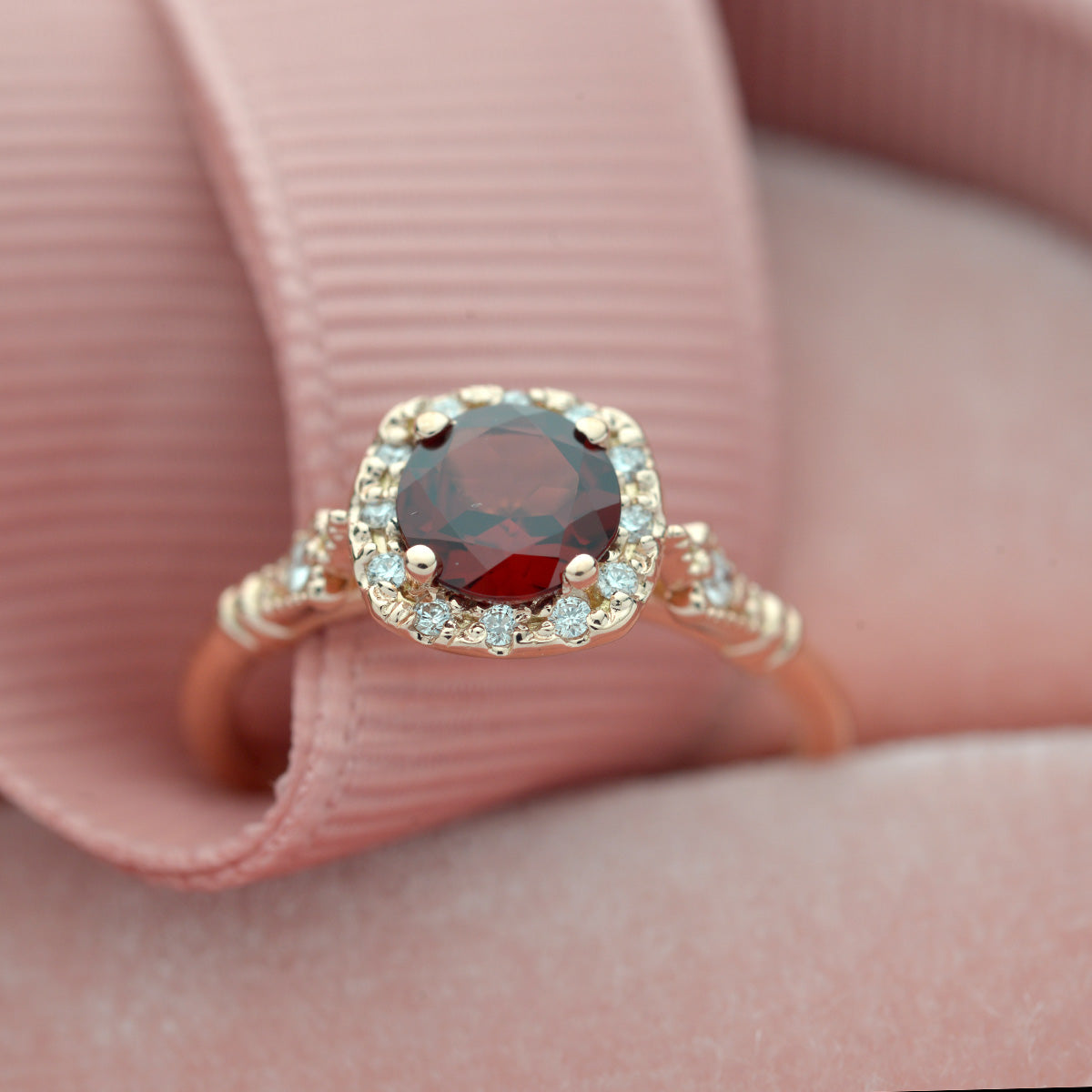 rose gold cushion halo engagement ring red garnet red center