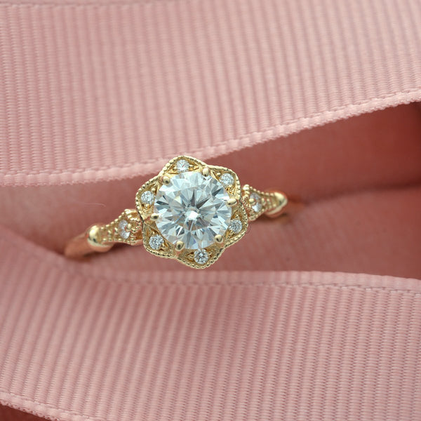 gold engagement ring flower halo
