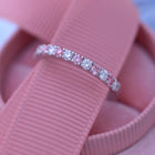 Wedding band with pink lab diamonds and white diamonds in white gold