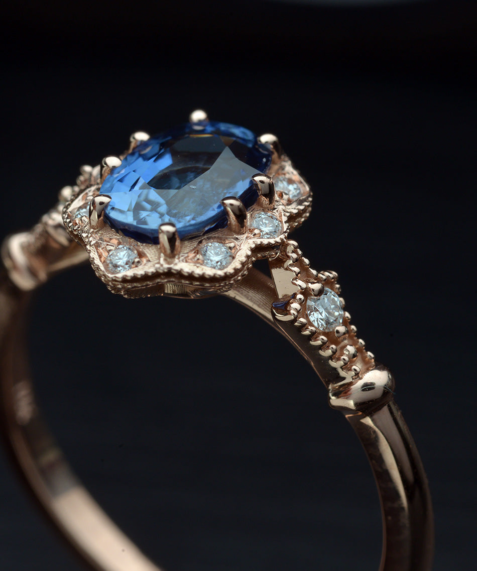 Rose Gold Engagement Ring with cornflower blue sapphire