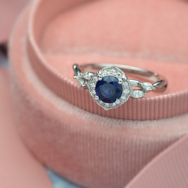 blue sapphire halo engagement ring vine twisted band