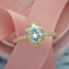 yellow gold oval halo engagement ring vintage style