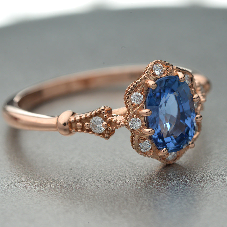 Rose Gold Engagement Ring with cornflower blue sapphire