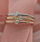 3 bizel mini bands in withe, pink and yellow gold