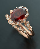 red garnet oval halo rose gold engagement ring setvintage look