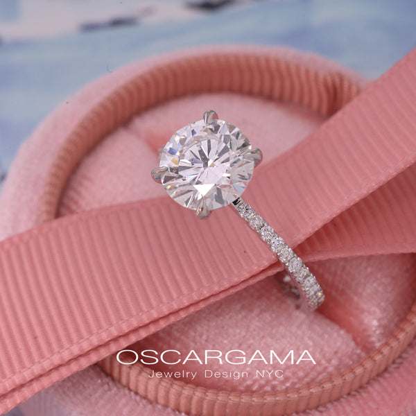 Solitaire with diamonds around it Outlet