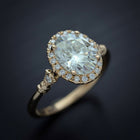 oval halo engagement ring vintage style in yellow gold