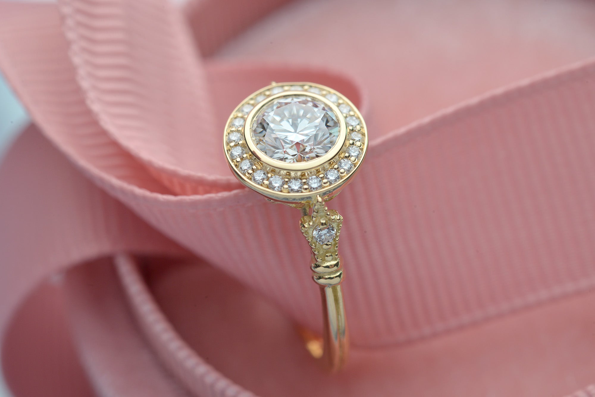 round bezel halo vintage look engagement ring in rose gold