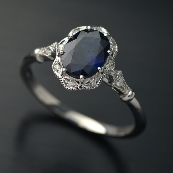 white gold halo oval flower engagement ring vintage style with blue sapphire