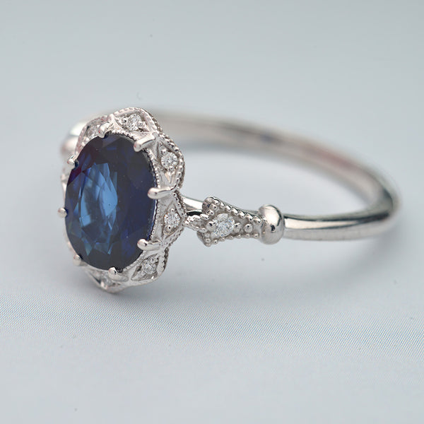 blue sapphire engagement ring halo vintage inspired in white gold