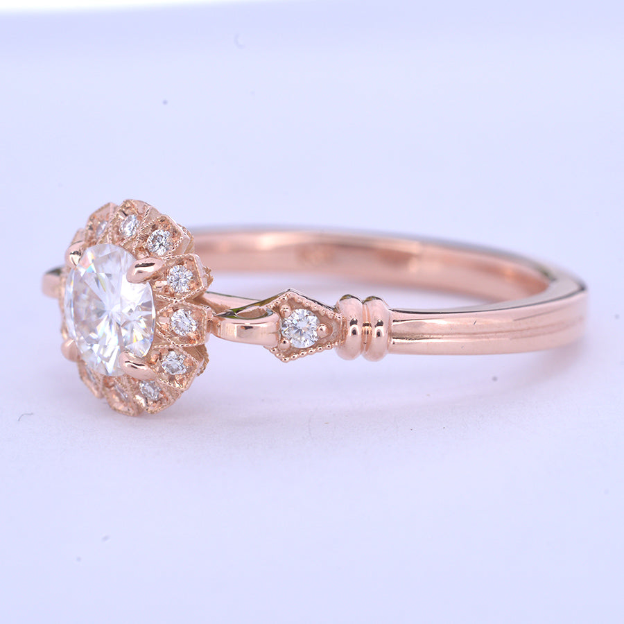 round halo vintage inspired engagement ring in rose gold  side view