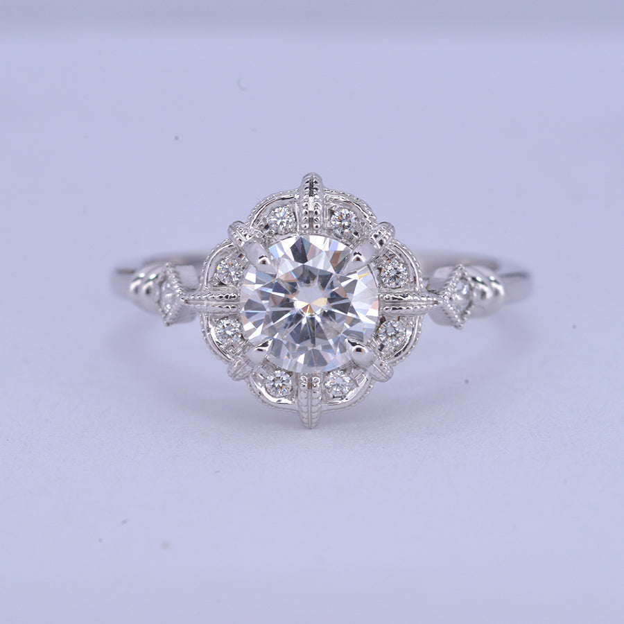 round halo vintage look engagement ring in withe gold