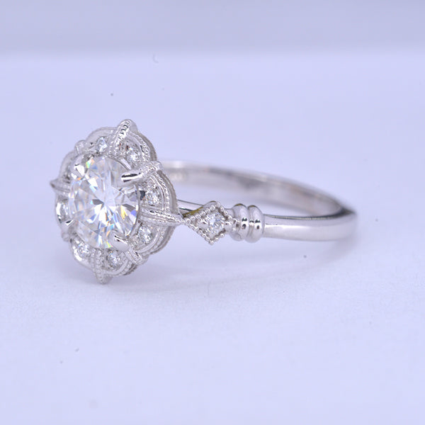 round halo vintage look engagement ring in withe gold
