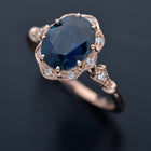 rose gold halo oval flower engagement ring vintage style with blue sapphire