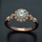round halo vintage inspired engagement ring in rose gold  top