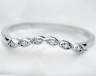 curved scalloped wedding band with 6 diamonds in white gold
