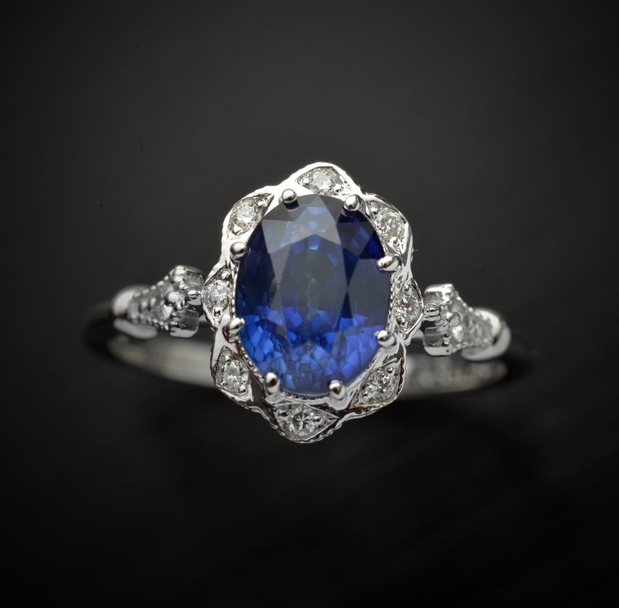 blue sapphire engagement ring halo vintage inspired in white gold