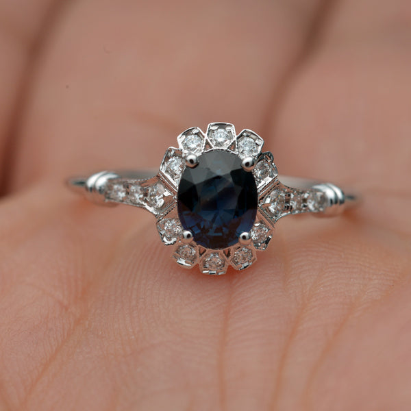 oval blue sapphire engagement ring in white gold vintage look