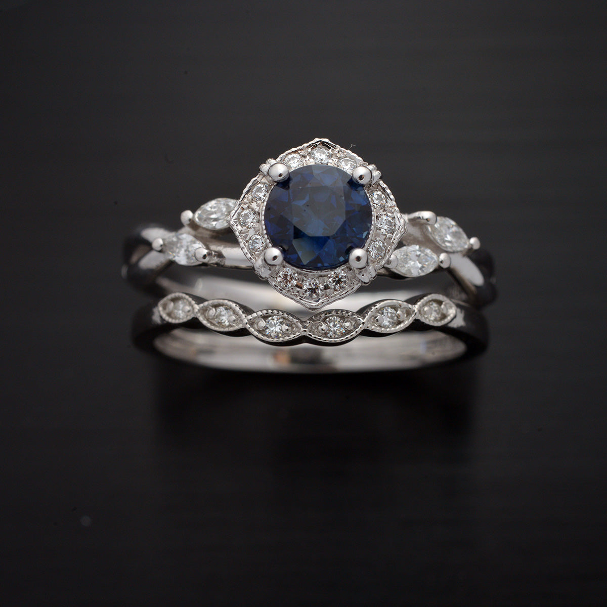 blue sapphire halo engagement ring vine twisted band