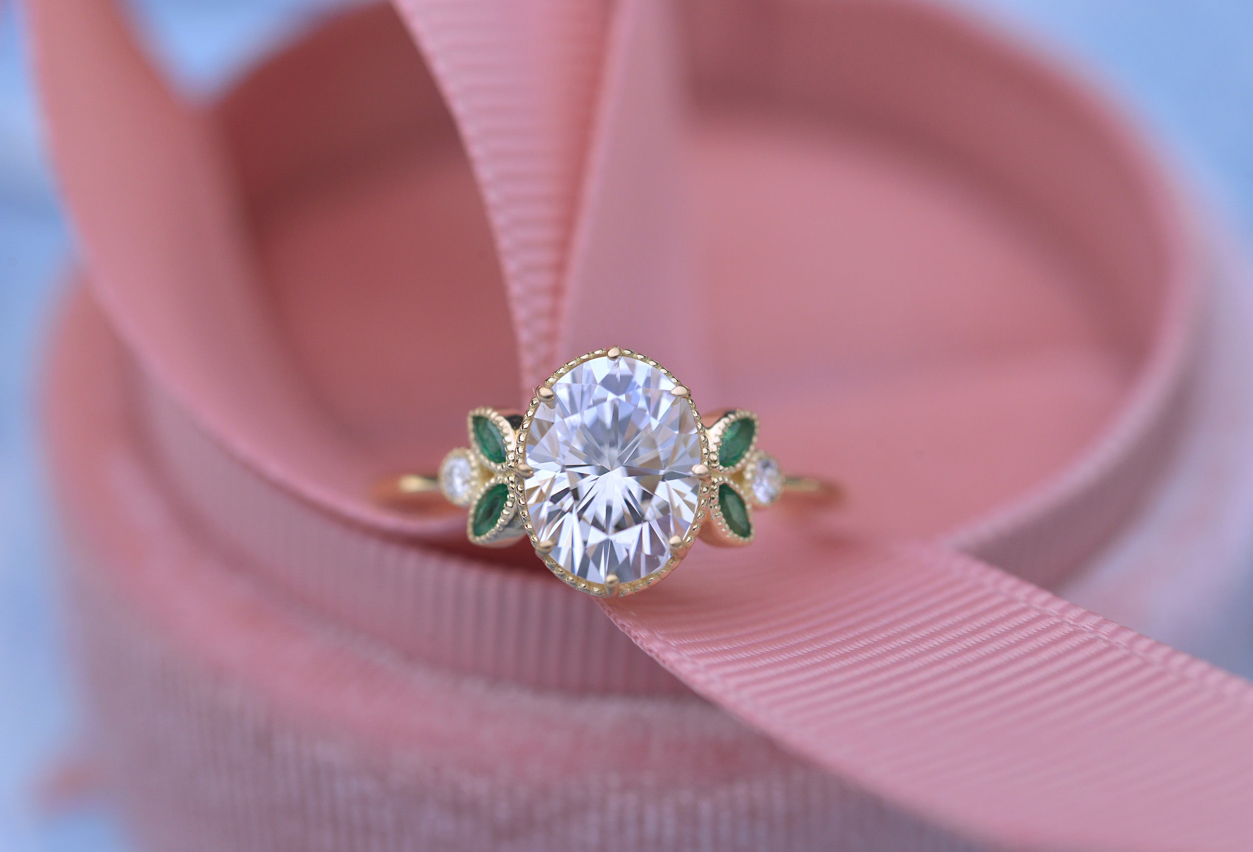 Oval engagement ring with marquise rubies in rose gold vintage inspired