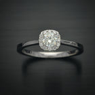 engagement ring with a cushion halo in white gold