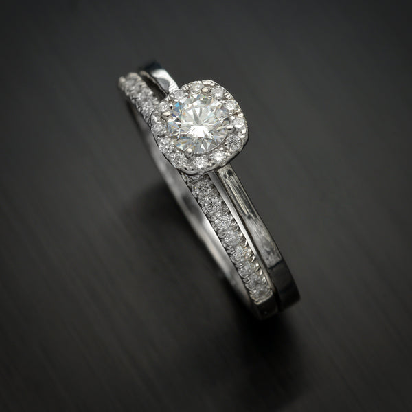 Classic Cushion style halo diamond engagement ring with top micro pave