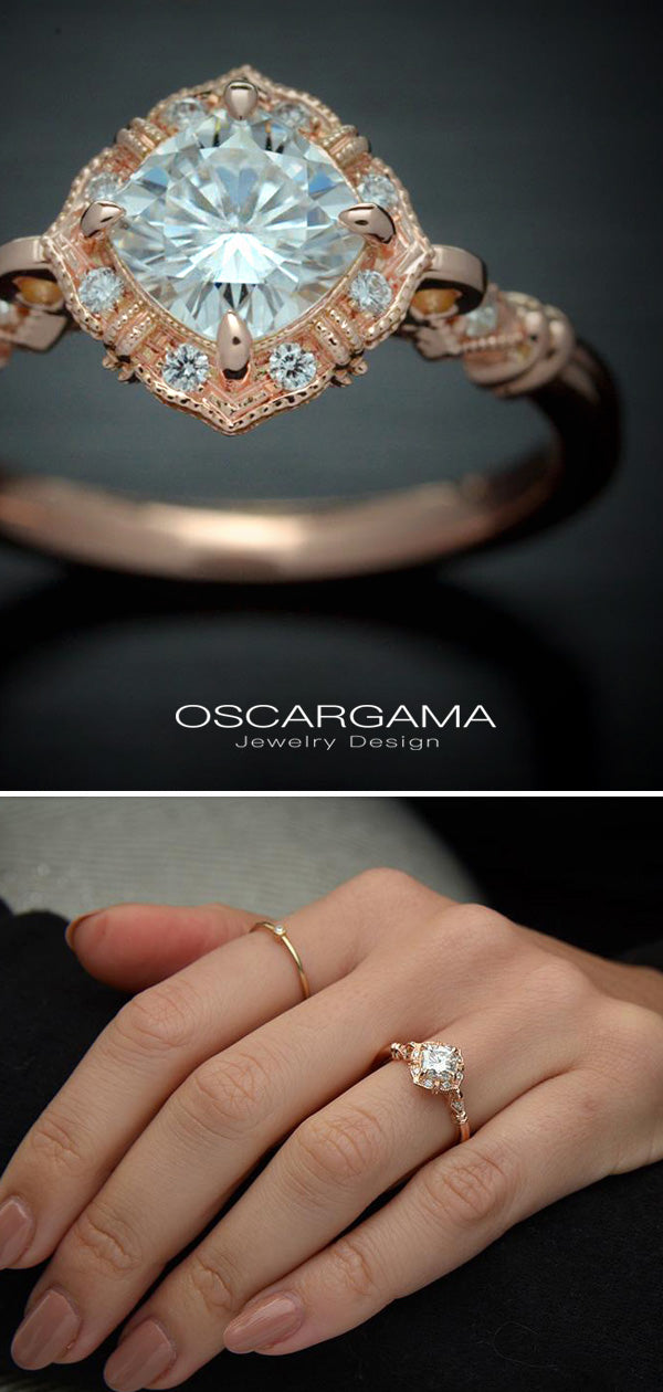vintage cushion halo engagement ring in rose gold in model's hand