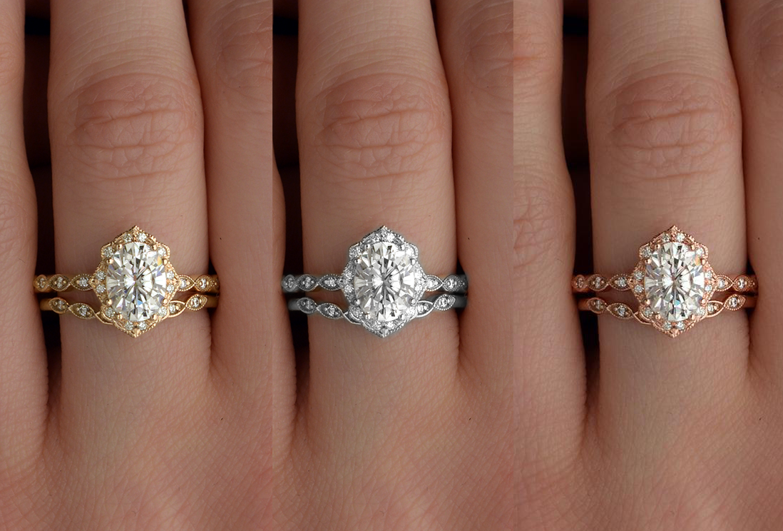 Engagement ring oval halo vintage look rose gold in a hand